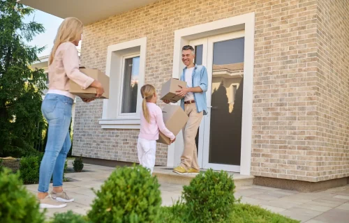 young family moving to a new house young family moving to a new house